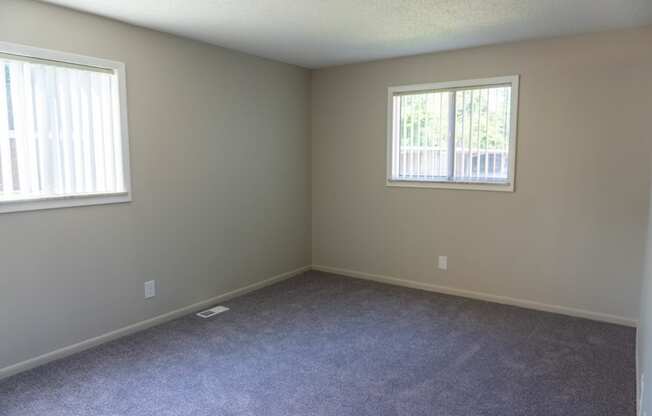 Spacious bedroom at Carriage House Apartments in Flint, Michigan