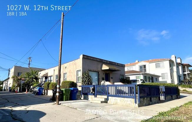 1027 W 12 ST