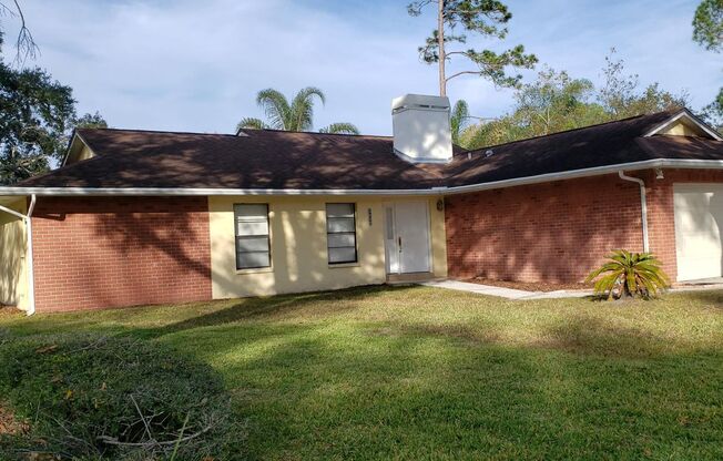 Enjoy Peaceful Living in this Northdale Corner Lot Single Family Home