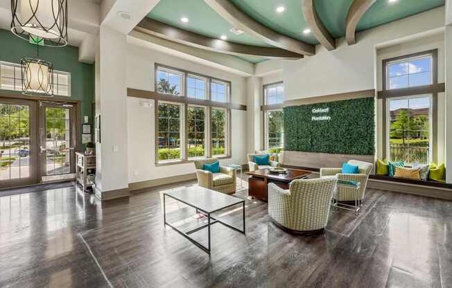 A spacious living room with a glass table and chairs.