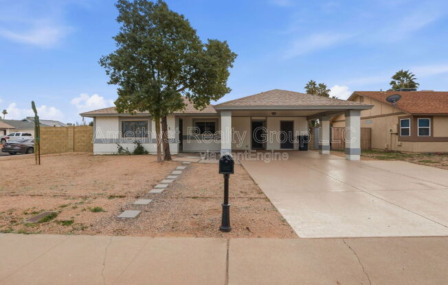 6201 W ACOMA DR