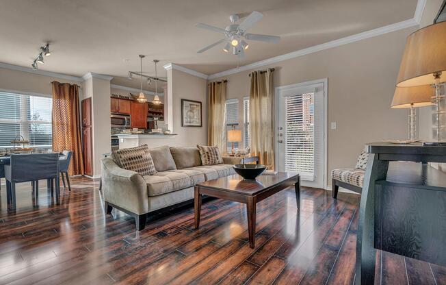 a living room filled with furniture and a fireplace