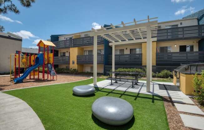 Picnic area and playground at Horizon Apartments in Santa Ana, California