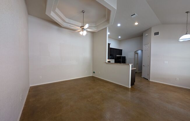 Stained Concrete Floors / No Carpet / Fridge / Covered Back Patio / CISD