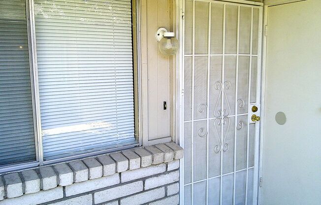Adorable Single Level Eastside Duplex With Evaporative Air Located In Quiet Neighborhood