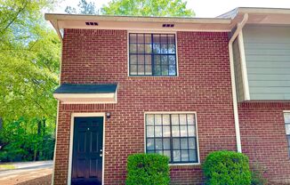 Welcome to this ADORABLE Space, a charming 2 bedroom, 2 bathroom townhome located in Fayetteville, GA