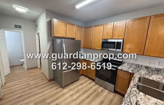 End Unit Townhouse Available Now, Loft Area, Vaulted Ceilings, Patio, 2 Car Garage