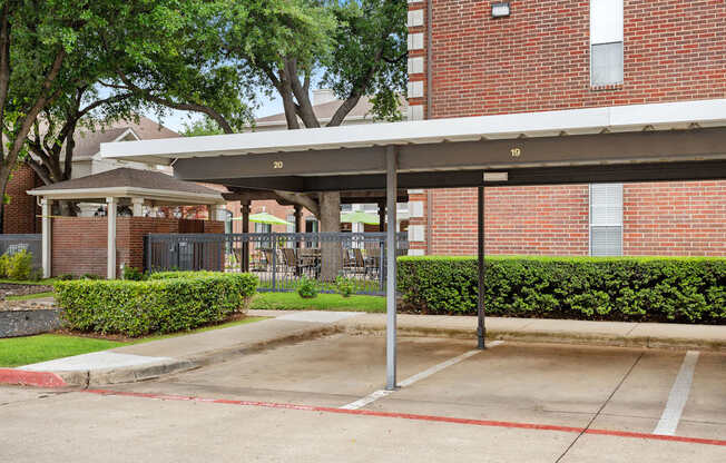 A parking lot with a red line painted on the pavement.