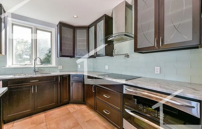 (Promo: $500 Utility Rebate!) STATE OF THE ART Gem in Coolidge Corner!  Covered Parking. Ht & HW Inc!  Laundry in Unit