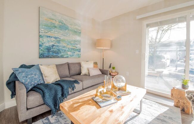 a living room with a couch and a coffee table