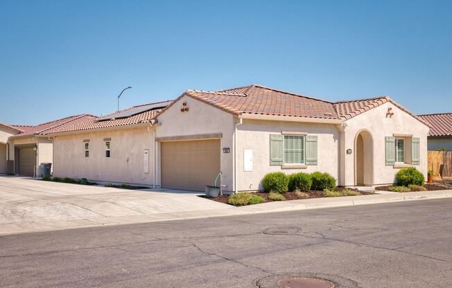 REDUCED!!  Is it Retirement Time for You?!? - 2 Bedroom 2 Bath plus Den in beautiful gated community WITH SOLAR!