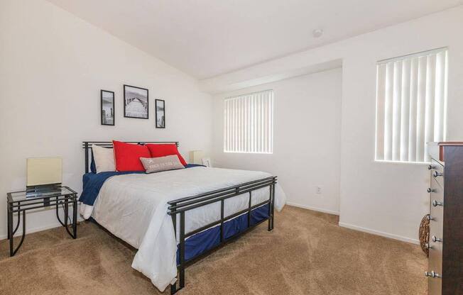 a bedroom with a bed and a closet at Riverview Springs, Oceanside, CA