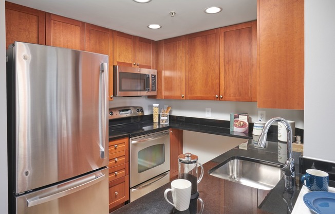 Newly Renovated Kitchen With Wood-Style Flooring Throughout