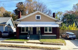 Belmont neighborhood  2 or 3 bed, 2 bath brick bungalow with fenced yard