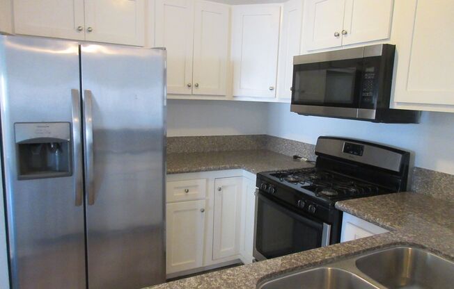 Duggan Property Management, Inc presents, Granada Hills Condo on Woodley.