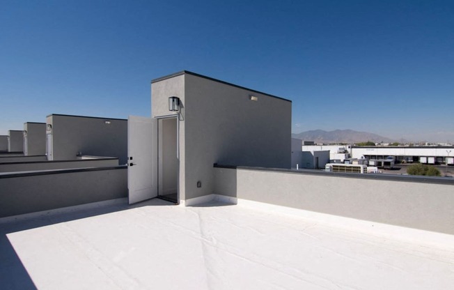 the roof of the building with the sky in the background