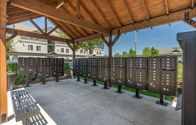 A row of black plaques are on display under a wooden roof at Forestplace Apartment Homes, Forest Grove, 97116