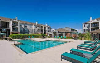 Resort-style swimming pool with heated spa - Emmersyn at Lone Tree