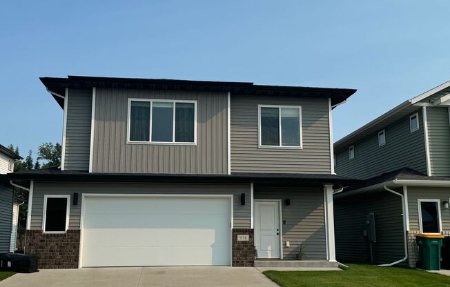 4-bedroom, 3-bathroom West Fargo Single-Family Home w/ 2 Stall Garage