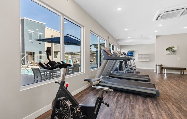 the gym at the enclave at woodbridge apartments in sugar land, tx at Loma Villas Apartments, San Bernardino California