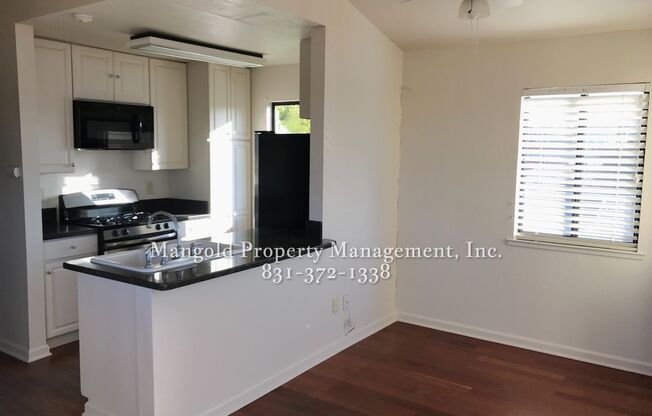 Charming Two-Story 2-Bed 2-Bath Home with Wrap-Around Balcony & Hardwood Floors in Seaside