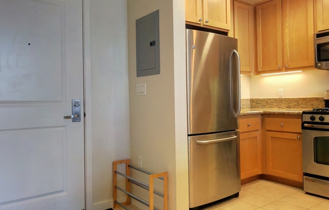 1 Bed, 1 Bath Penthouse Level Condo w Parking - Across from BART