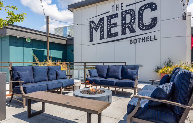 The Merc Apartments Outdoor Terrace and Firepit with Couches