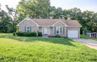 Amazing Brick Front Ranch Home With Hardwood Flooring and Fireplace