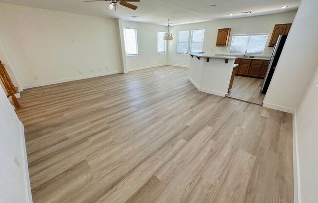 4 bed 2.5 bath home in the southwest with 3 bedrooms downstairs and the master bedroom upstairs! New LVP flooring installed throughout the house!