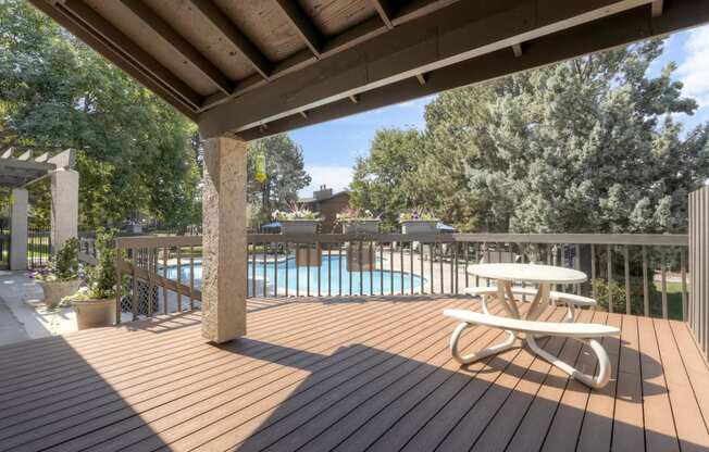 The Community Outdoor Deck and Swimming Pool at Greentree Village Apartments