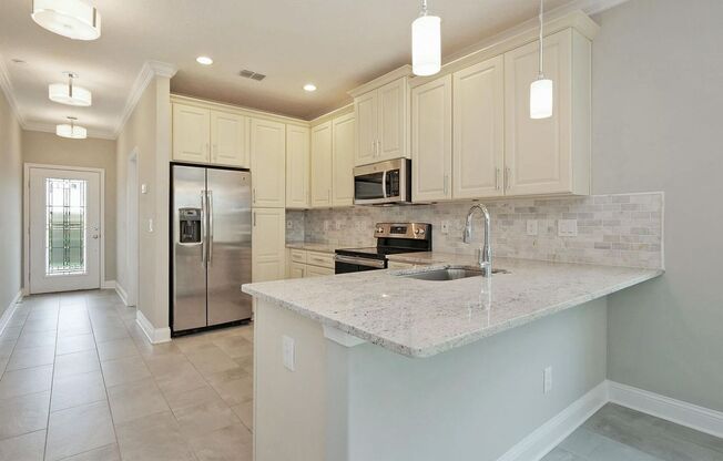 4 Bedroom 3.5 bath Beauty in Just a Short Stroll to Jax Beach - Garage, Lawncare Included & Fenced in Back Yard!