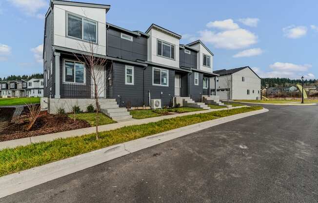 Exterior view of building with a street in front at Thrive at Green Mountain, Camas