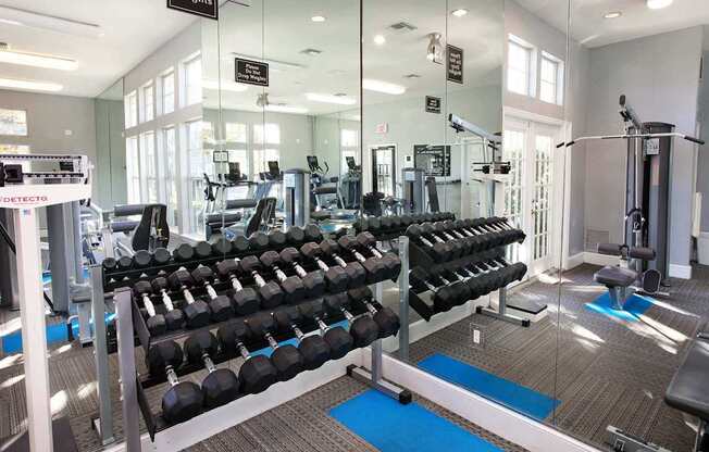 Fitness studio with free weight station