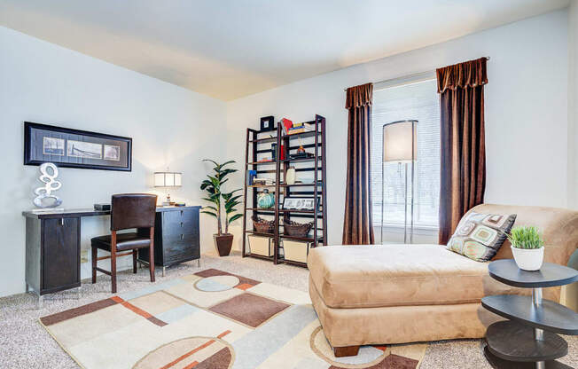 Model Living Room with Study Desk at Bay Pointe Apartments, Indiana, 47909