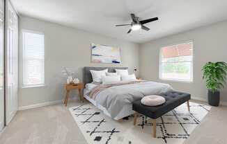 a bedroom with a bed and a ceiling fan at Valley Plaza Villages, Pleasanton, 94566