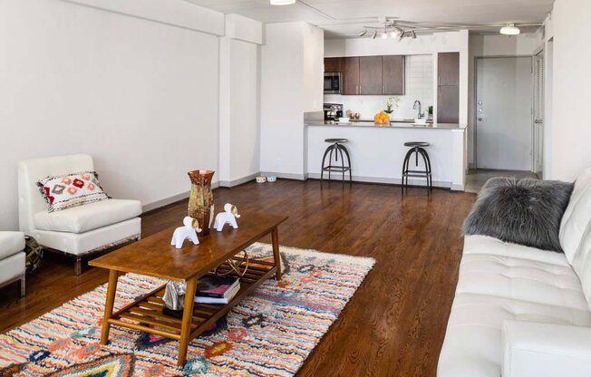 Living Room With Kitchen View at Memorial Towers Apartments, The Barvin Group, Houston, 77007