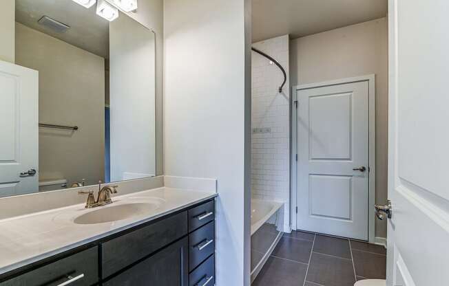 Bathroom with a large mirror at The View at Old City, Philadelphia