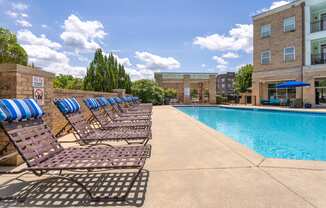 our apartments offer a swimming pool with chaise lounge chairs