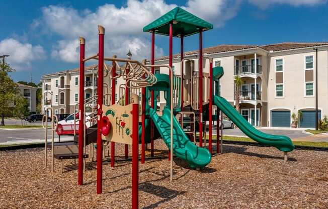 the playground with slides and climbing rungs at the Flats at Sundown in North Port, Florida