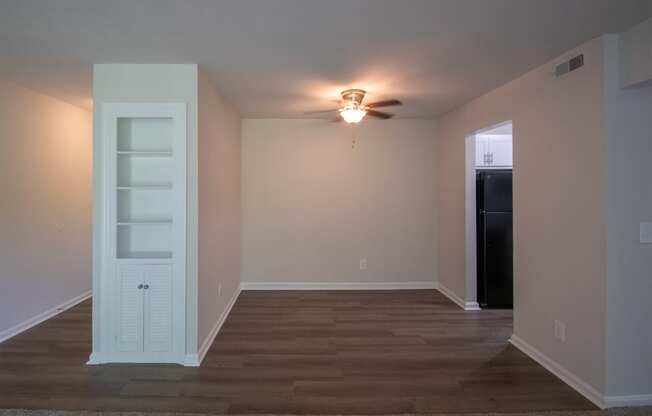 This is a photo the built-in bookshelf and dining area of an upgraded 1030 square foot, Oak 2 bedroom, 1 bath apartment at Montana Valley Apartments in the Westwood neighborhood of Cincinnati, OH.