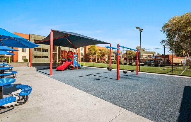 Playground with swings at Saratoga Ridge, Arizona, 85022