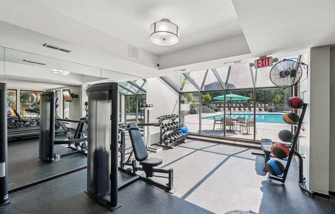 A spacious 24/7 fitness center with Peloton and LifeFitness equipment, also equipped with a view!