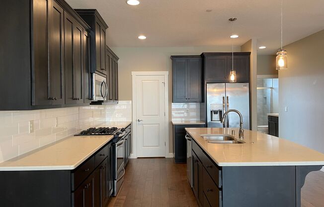 LUXURY 4 Bed Camas Townhome! Gated Community With Over-Sized Tandem Garage! Camas School District! Fenced Backyard!