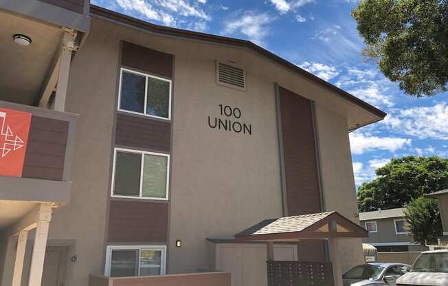 a building with a sign that reads 100 union