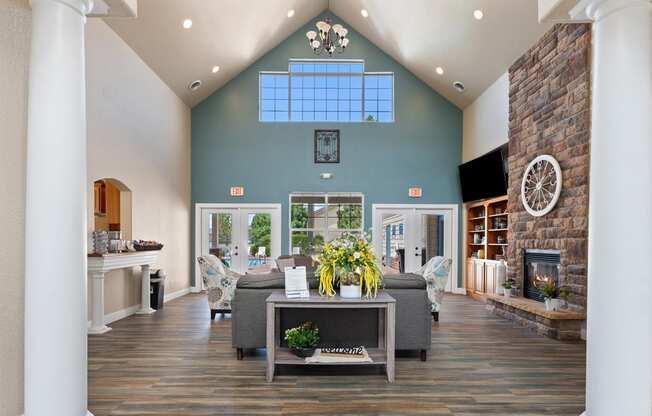 a living room with couches and a fireplace