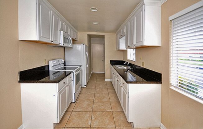 Charming 2BR Condo with Nice Patio and 1 Car Garage!!!