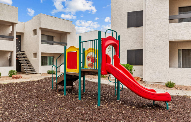 a playground at the whispering winds apartments in pearland, tx