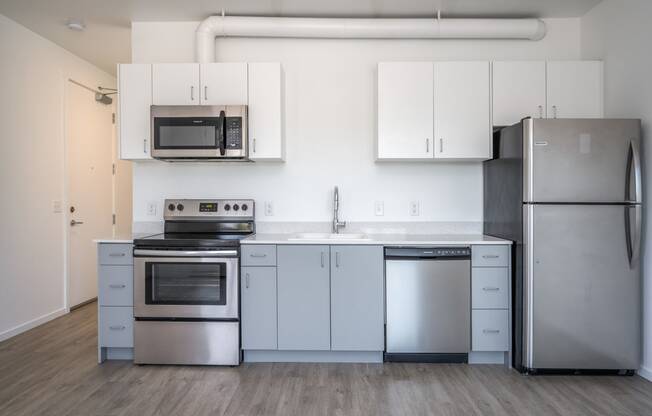 The Lenox | Kitchen Area with Stainless Steal Appliances