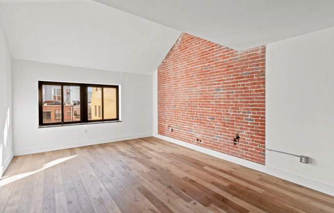 Experience modern city living with this stylish loft space featuring unique architectural details.