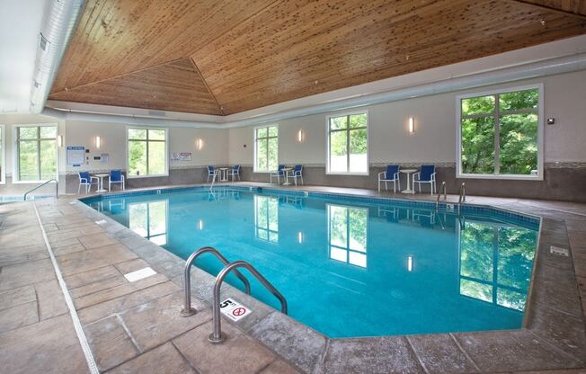 Laurel East End Apartments in Golden Valley, MN photo of a swimming pool in a building with a wood ceiling